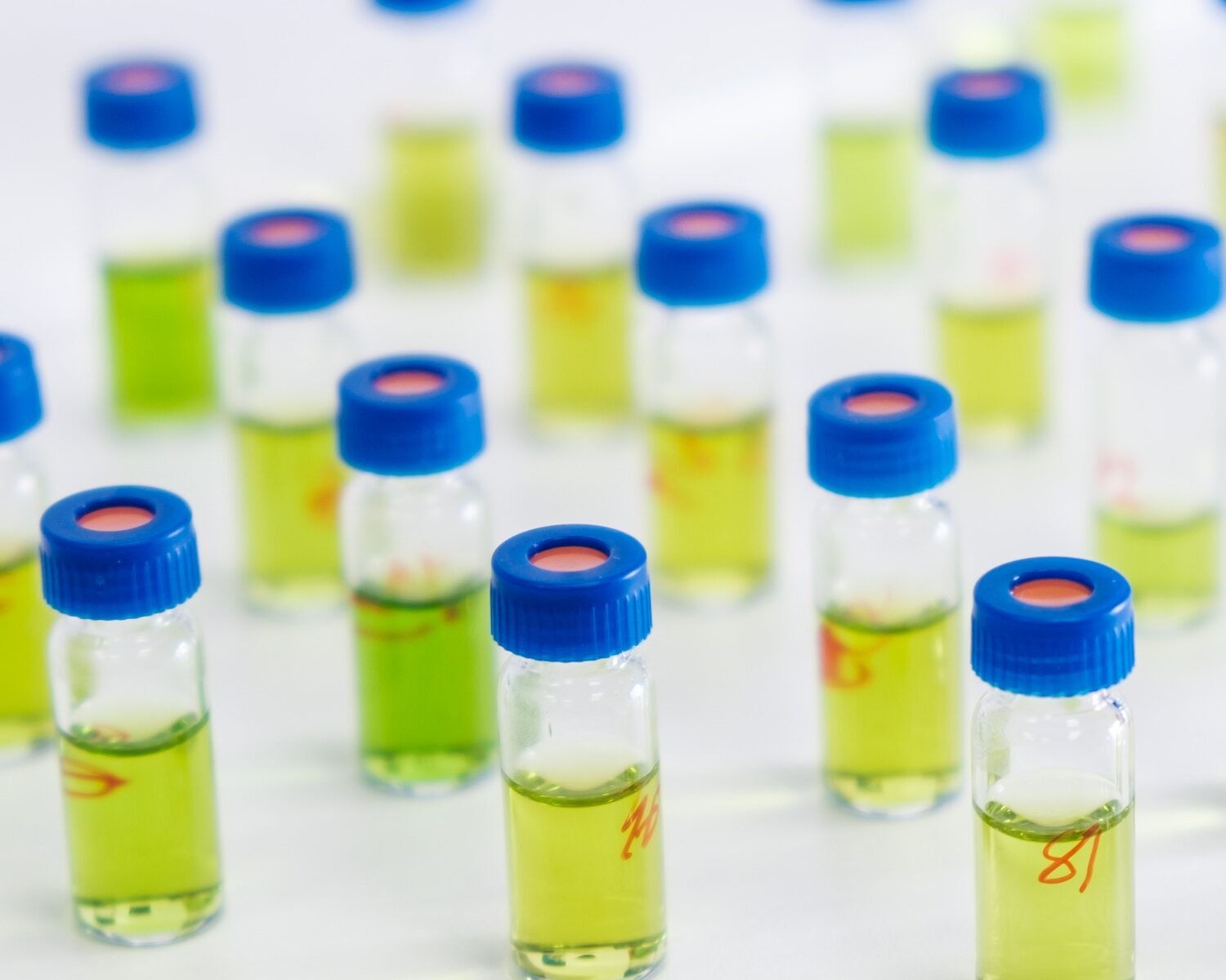 Pattern from HPLC glass vials with green fluid. Pharmaceuticals and chemical analysis